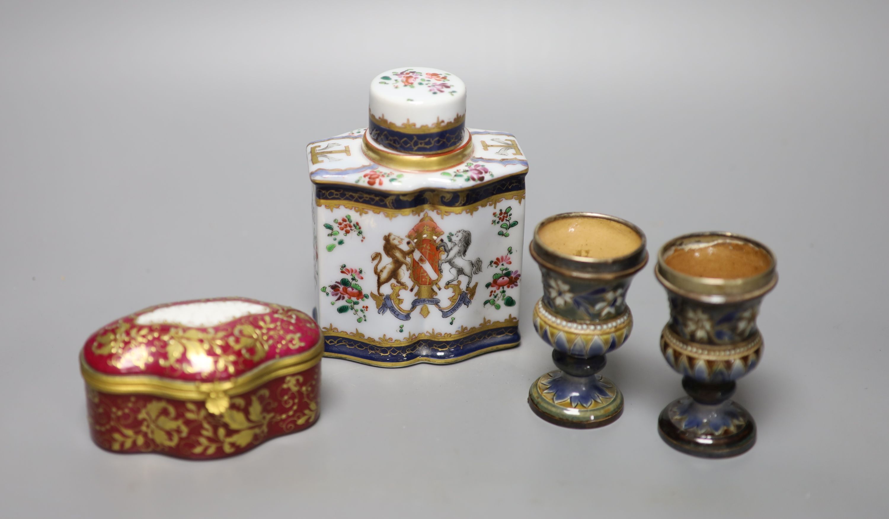 A Samson crested porcelain lidded tea caddy, height 13cm, together with a Limoges lidded porcelain casket,